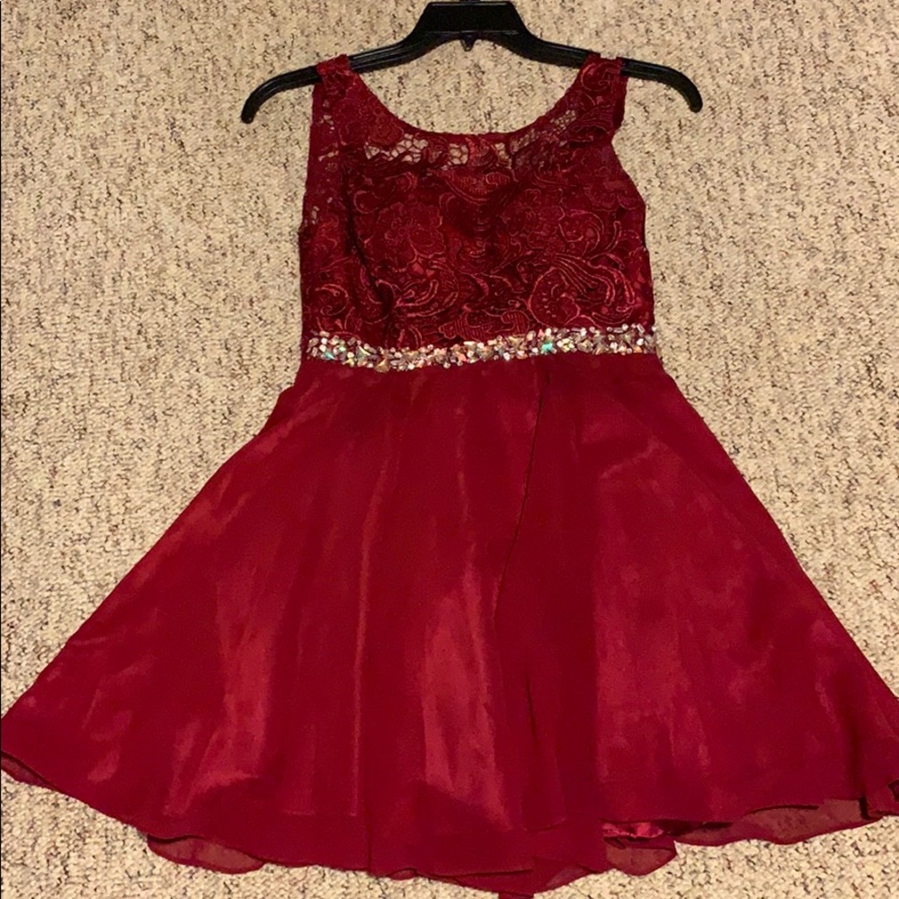 Maroon colored homecoming dress.